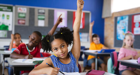 Elementary School Girl Raising her hand