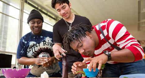 Students in a digital photography class create fake ice cream for a photo shoot.