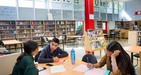 Students at Skyline High School work together during an after-school tutoring club.