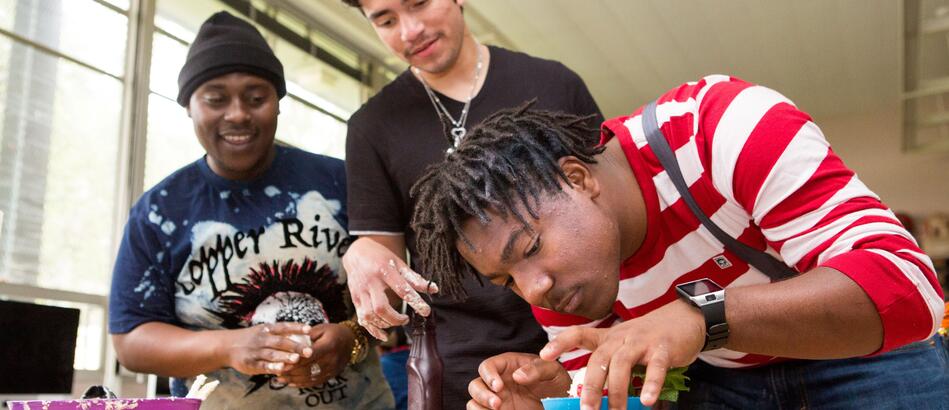 Students in a digital photography class create fake ice cream for a photo shoot.