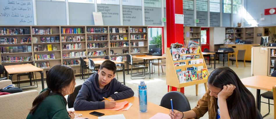 Students at Skyline High School work together during an after-school tutoring club.